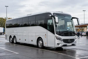 White 37-seat executive coach at a UK motorway service area